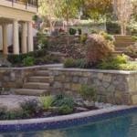 backyard stone swimming pool hardscape great falls virginia