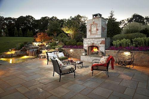 patio with lighting and fireplace in northern virginia