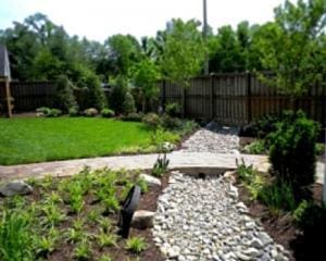 French drain with rock and a bridge